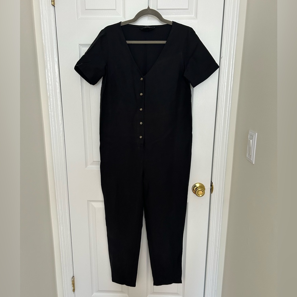 Hatch Black Short-Sleeve V-Neck Button-Front Jumpsuit